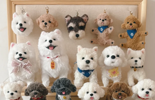 a lot of cute puppies made out of pipe cleaners hanging on the wall